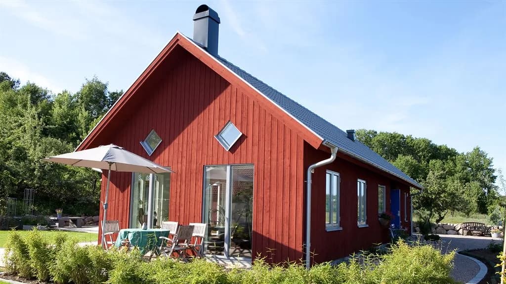 Visualisering av rött enplanshus i klassisk stil