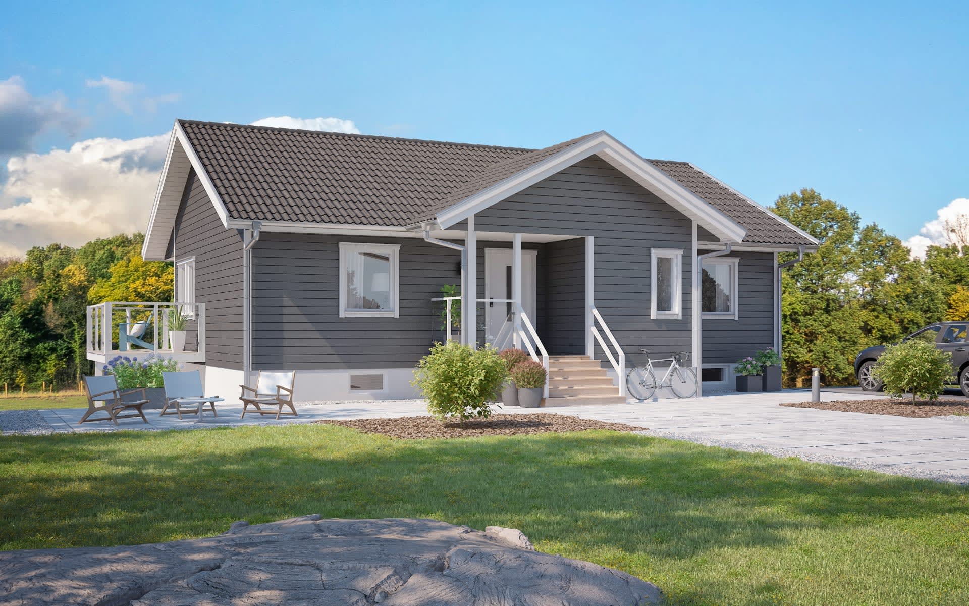 Villa Östanskog sluttningshus i två plan med balkong, glasräcke och sadeltak