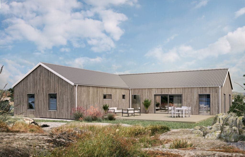 Villa Tylö enplanshus i vinkel med sadeltak och träpanel