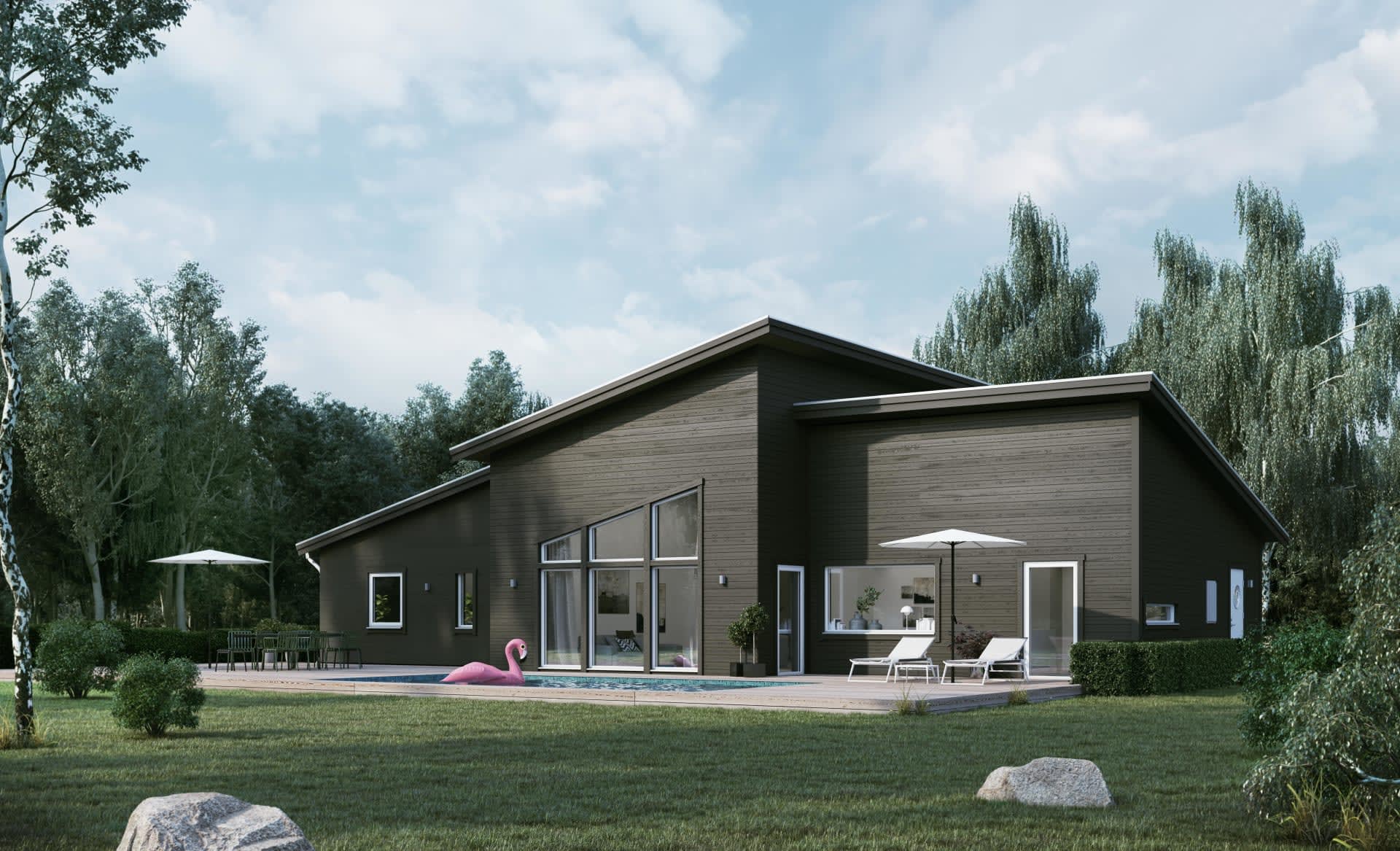 Villa Kämpinge baksida enplanshus med åstak och träpanel,