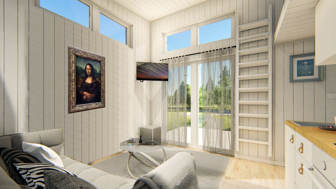 Stora rummet med ljust fönsterparti.