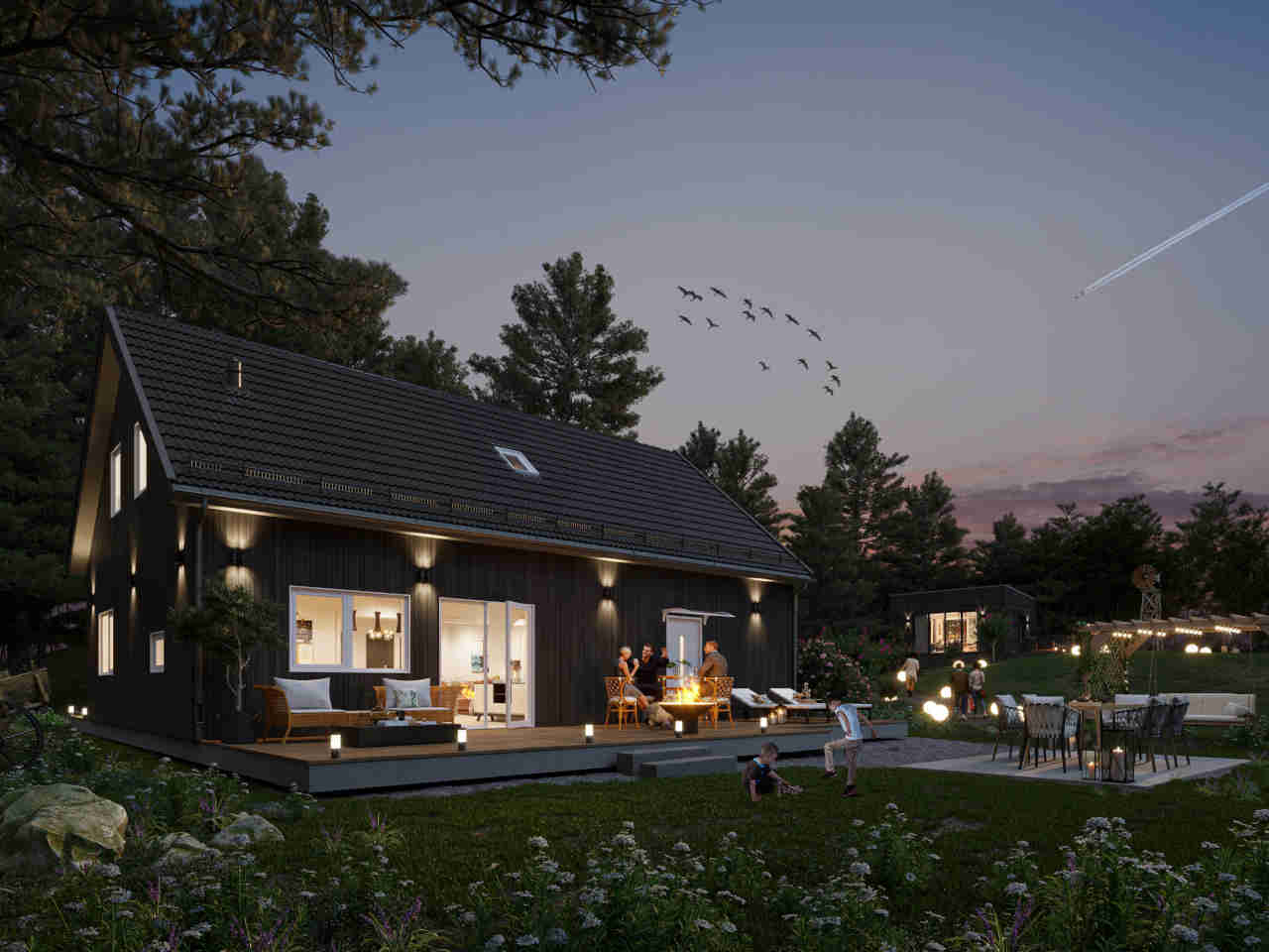 Fasad från kök mot uteplats med fönsterpartier