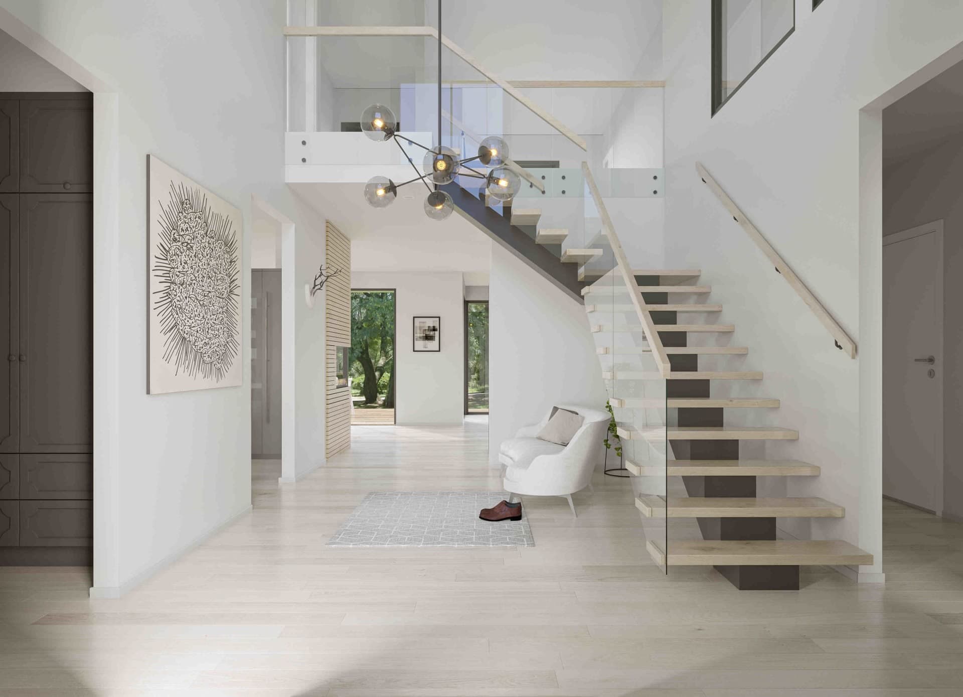 Entrérum med klädkammare, trapp och 5.5 meter högt i tak