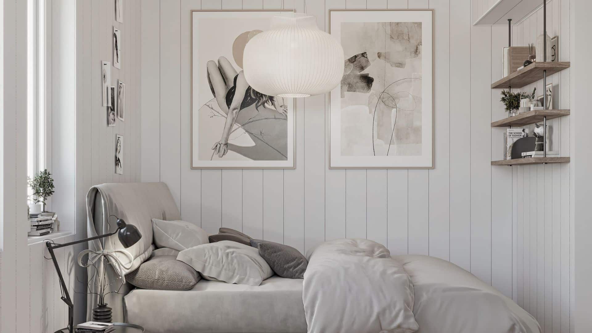 fritidshus sovrum med tavlor