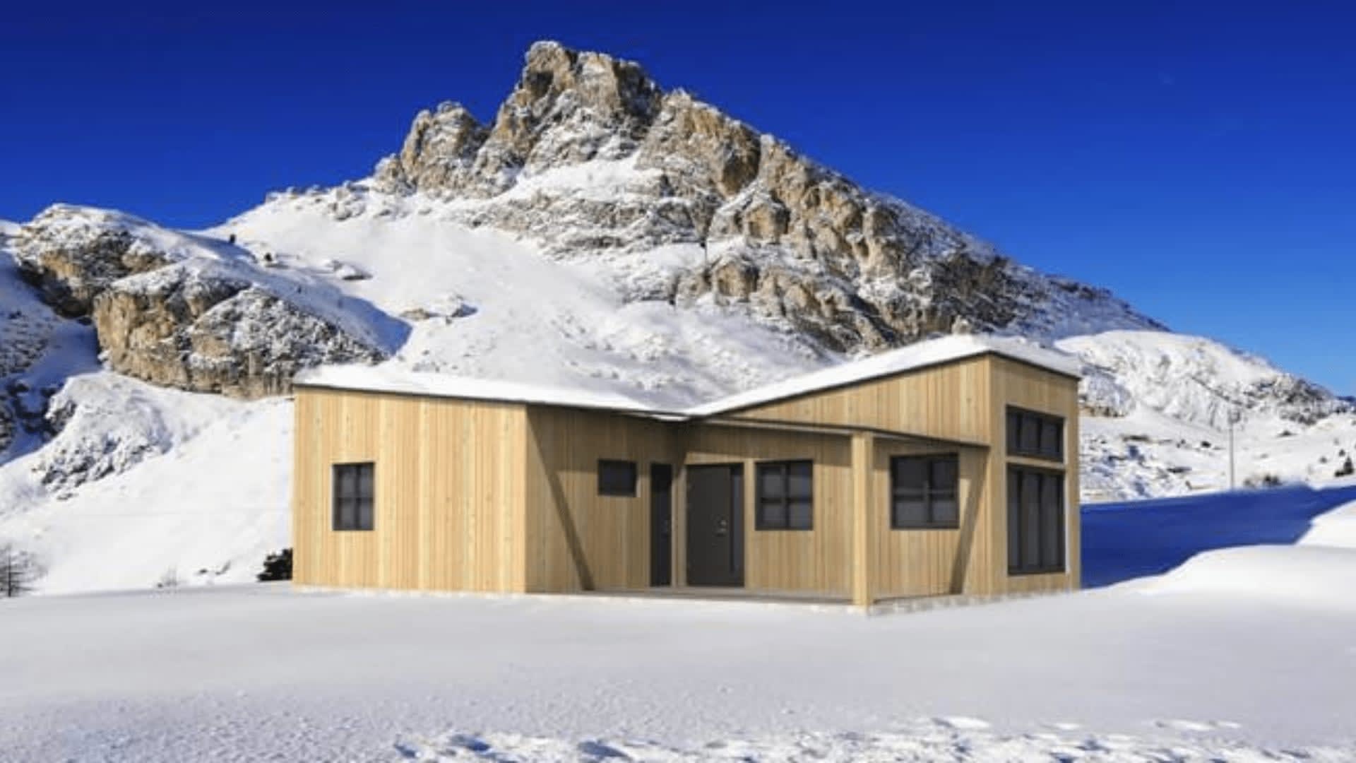 Ljus fjällstuga exteriör modern